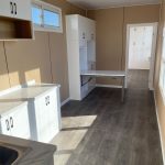 40ft Deluxe Accommodation Container Modules interior kitchen and dining area to bedroom door