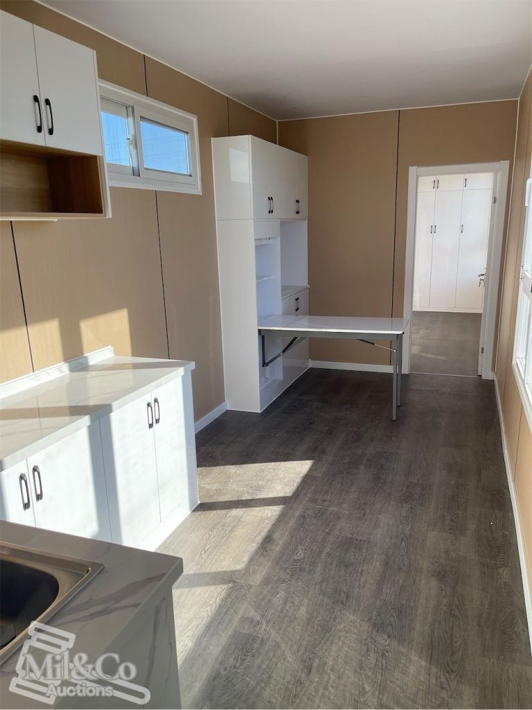 40ft Deluxe Accommodation Container Modules interior kitchen and dining area to bedroom door
