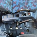 2005 Hino Ranger Tray Back Truck with Crane interior controls