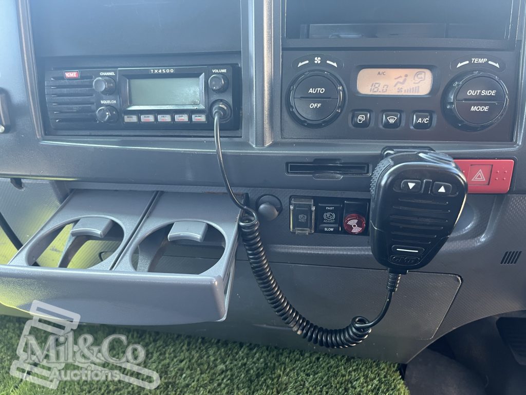 2012 Isuzu FVZ 1000 Tray Back Truck with Hiab interior showing UHF