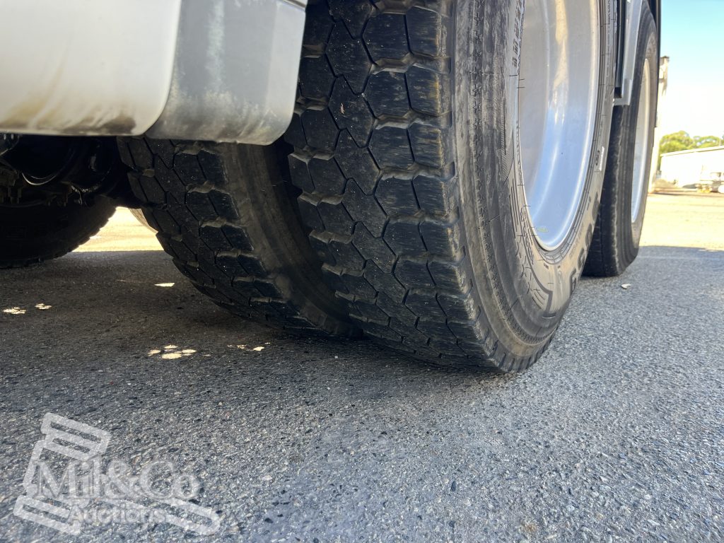 2011 Freightliner CST112 50 tonne Prime Mover with Hydraulics passenger front drive tyre tread