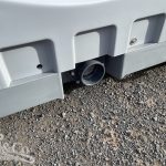 Portaloo exterior outlet valve