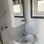 Toilet/Shower Block wall mount vanity and cabinet