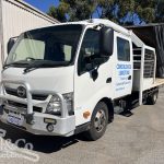 2015 Hino 300 717 Crew Cab Tray Back Truck exterior front passenger side corner