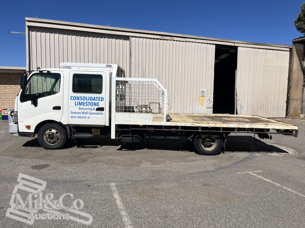 2015 Hino 300 717 Crew Cab Tray Back Truck exterior passenger side