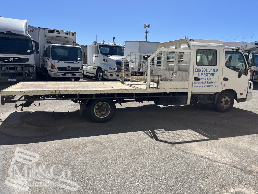 2015 Hino 300 717 Crew Cab Tray Back Truck exterior drivers side