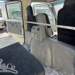 2015 Hino 300 717 Crew Cab Tray Back Truck interior back seat from drivers side