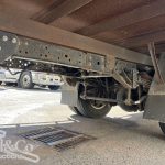 2015 Hino 300 717 Crew Cab Tray Back Truck chassis from drivers side