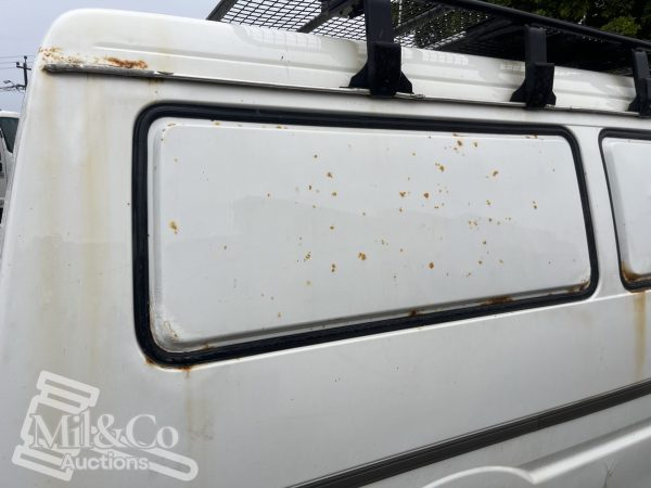 2003 Mazda E2000H Camper Van window panel rust