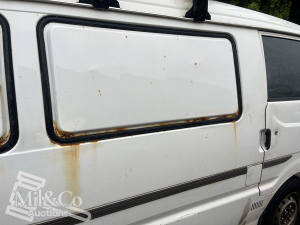 2003 Mazda E2000H Camper Van window panel rust